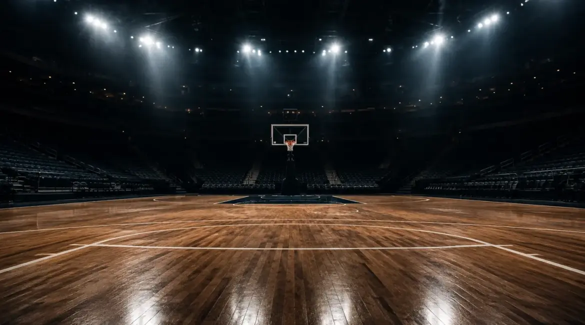 Üres kosárlabda aréna reflektorokkal az NBA playoff hangulatában